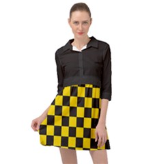 Checkerboard Pattern Black And Yellow Ancap Libertarian Mini Skater Shirt Dress by snek