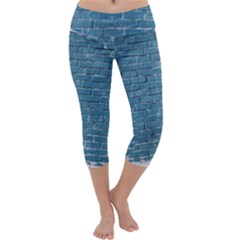 White And Blue Brick Wall Capri Yoga Leggings by artworkshop