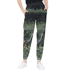 Astronaut Lying In Flowers Fantasy Tapered Pants by artworkshop