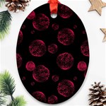 Red Sponge Prints On Black Background Oval Ornament (Two Sides) Front