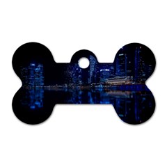 Illuminated Cityscape Against Blue Sky At Night Dog Tag Bone (one Side) by Modalart